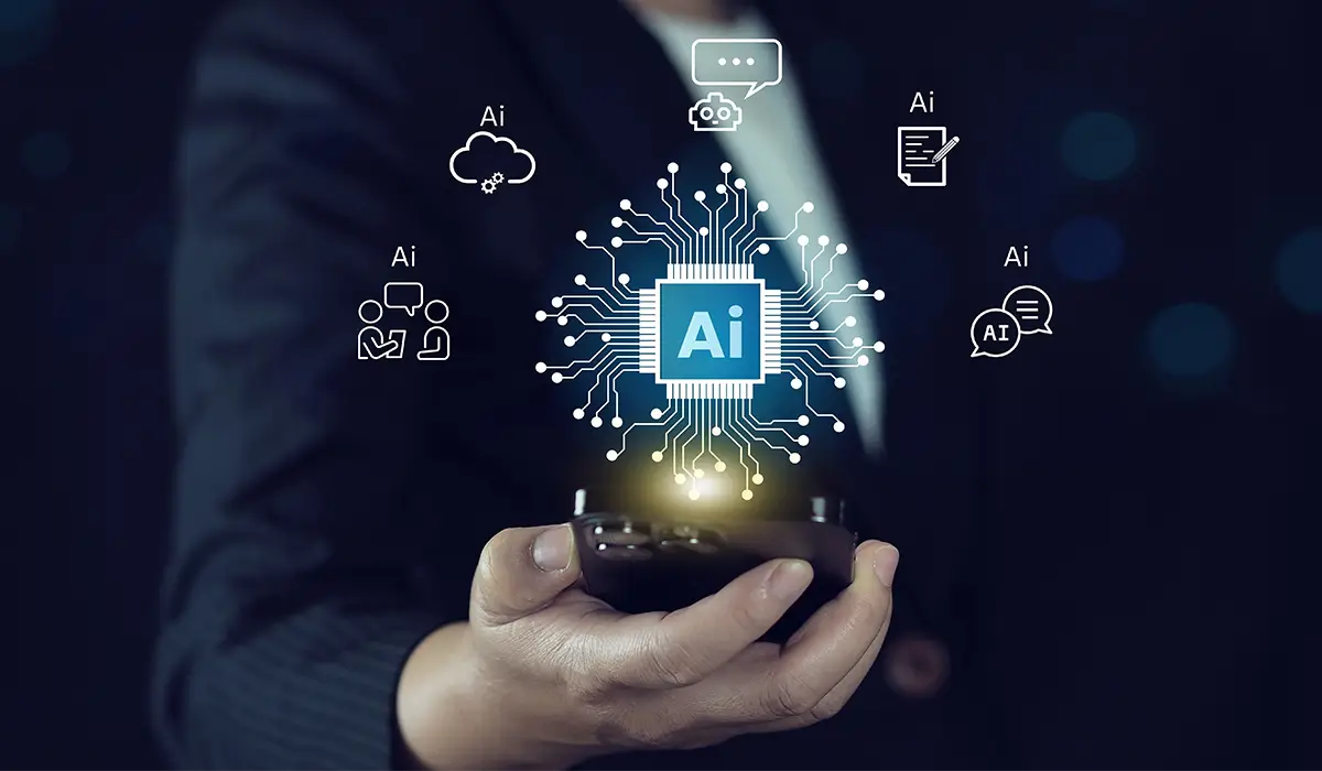 A person holds a smartphone displaying a central AI circuit graphic, surrounded by icons for various artificial intelligence applications such as chat, cloud, writing, and communication.